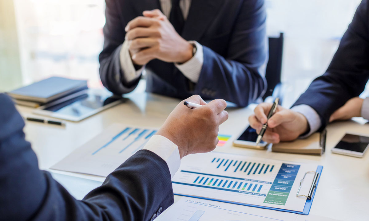 Group of business people meeting to discuss financial investment and marketing.